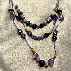Triple lower strand necklace